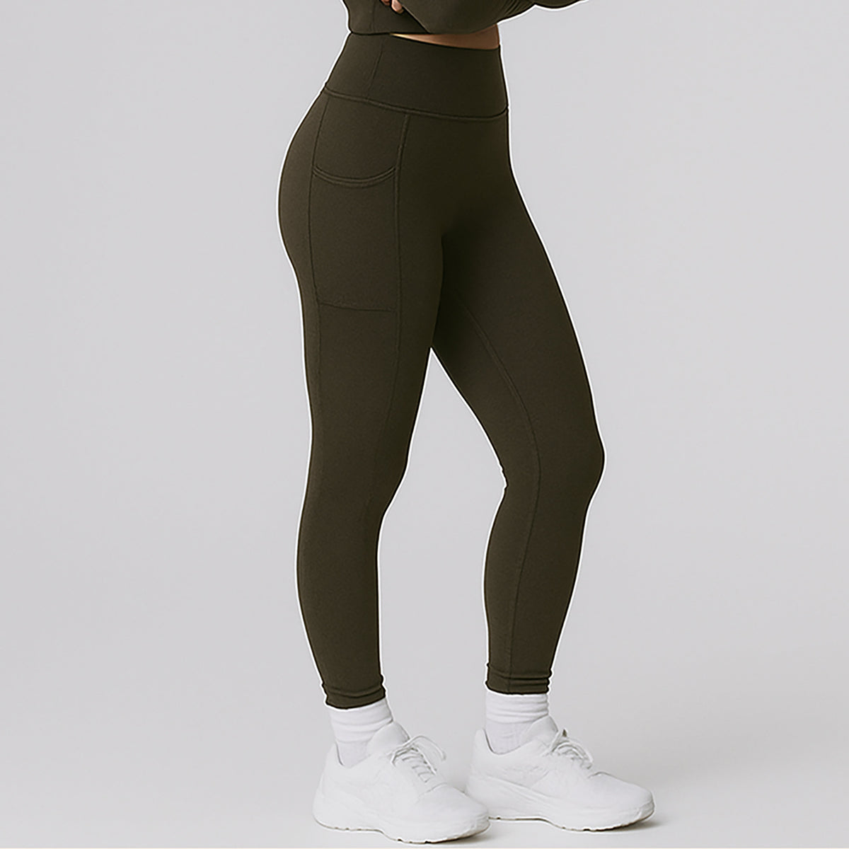 OTL high-waist pocket leggings, side view showing the pocket