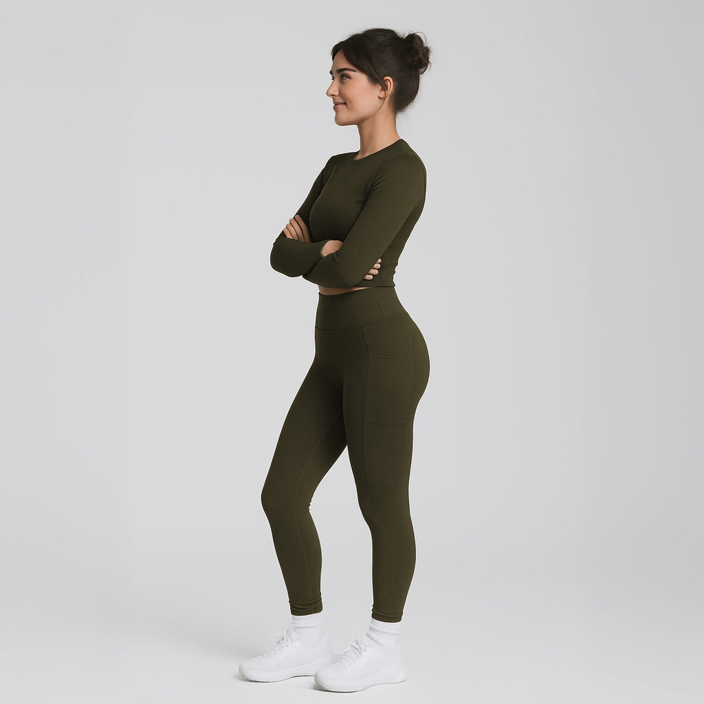 Model wearing OTL high-waist pocket leggings, side view