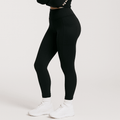 Black OTL high-waist pocket leggings, angled view